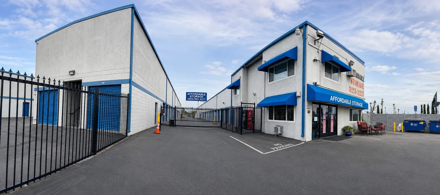 Front entrance, office, security gate, and storage buildings at The Affordable Storage